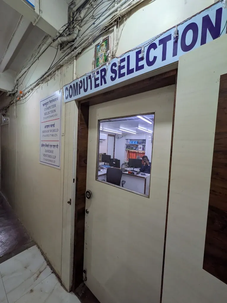 Computer Selection store entrance with signboard and GST number at Ahmed Mansion, Lamington Road